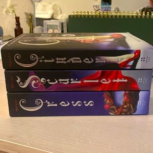The Lunar Chronicles book series (Cress, Scarlet, and Cinder)